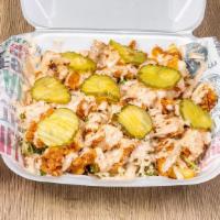 Loaded Fries · Chopped fried chicken on a bed of fries, vinegar slaw, comeback sauce and pickles (choose he...