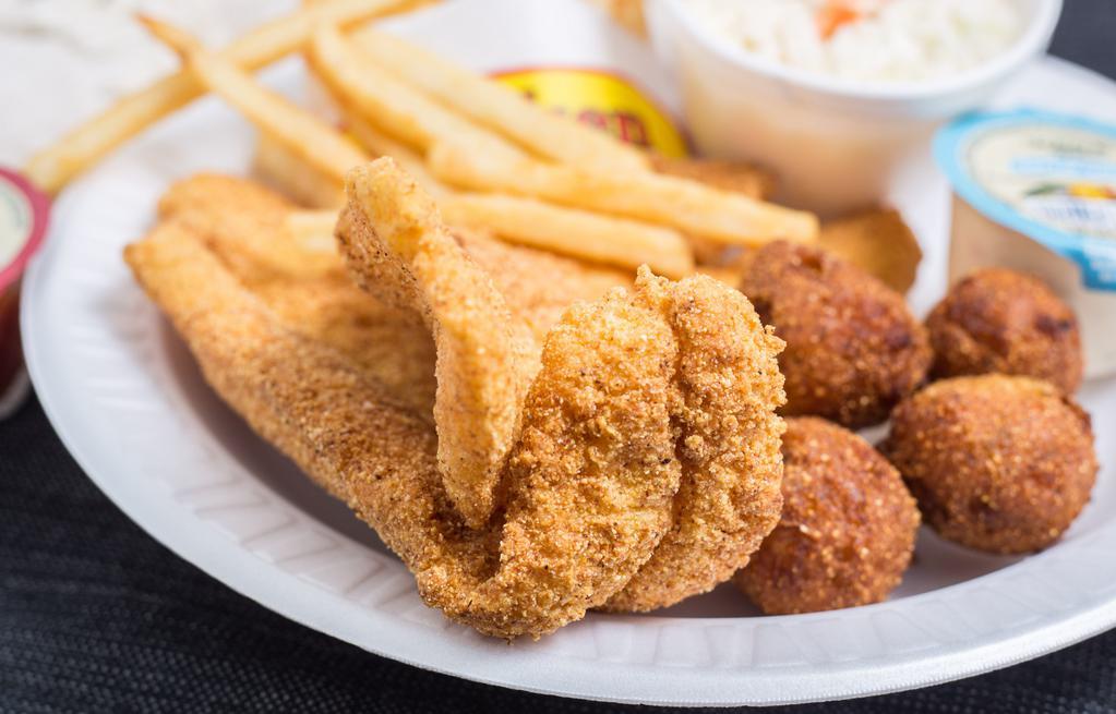 2 Piece Fish Fillets Dinner · 2 Fish Fillets served with choice of hushpuppies, biscuit or roll, cocktail or tarter sauce and 2 regular side.