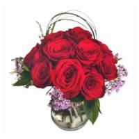 Love Is In The Air · A dozen roses hand-tied and placed in a clear glass vase.