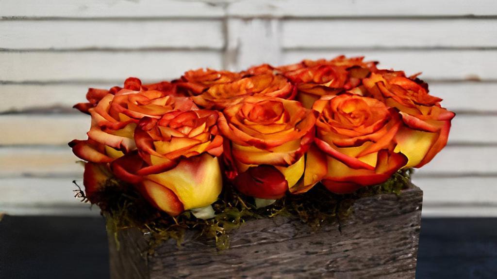 Contemporary Garden Of Roses · Modern bouquet of twelve roses in a wooden crate accented  with mood  moss.  You pick the color.