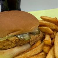 Fish Fillet Sandwich (Combo) · Fried fish fillet sandwich topped with house made tartar sauce with sliced pickles.  Comes w...