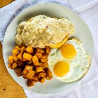 Biscuits & Jalapeno Cheddar Gravy · Jalapeno cheddar sausage gravy and two eggs.
