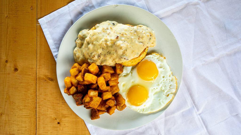 Biscuits & Jalapeno Cheddar Gravy · Jalapeno cheddar sausage gravy and two eggs.