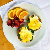 Eggs Florentine · Sauteed spinach, poached eggs, hollandaise sauce, on an English muffin.