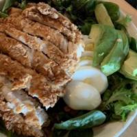 Cobb Salad · Gluten free. Mixed greens, onions, tomatoes, bleu cheese, bacon, hardboiled egg, and avocado.