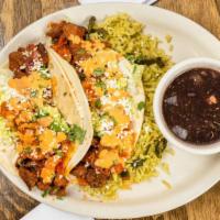 Surf & Turf · *OWNER'S FAVORITE*  
Two flour tortillas completely stuffed with sauteed shrimp, steak, avoc...