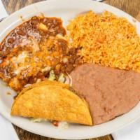 Rita'S Platter · *BAJA FAVORITE* 
The ultimate combo platter, including a crispy beef taco, chili cheese ench...