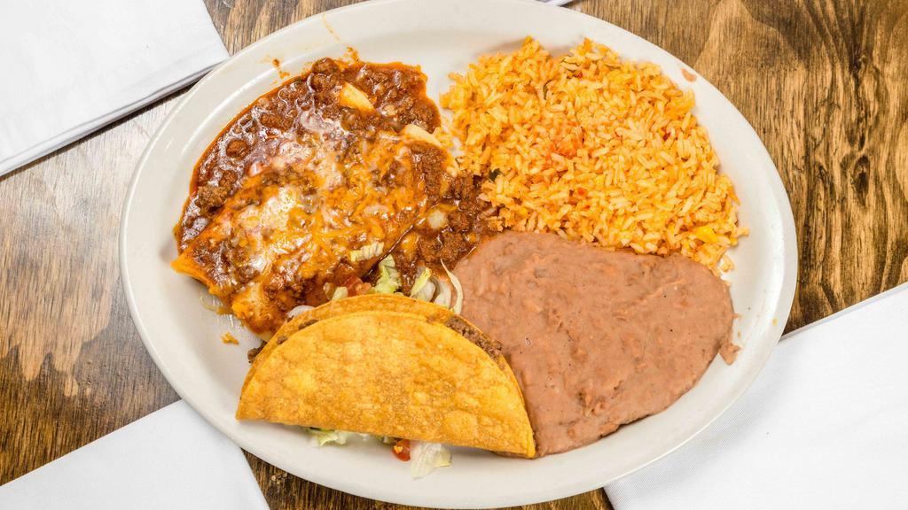 Rita'S Platter · *BAJA FAVORITE* 
The ultimate combo platter, including a crispy beef taco, chili cheese enchilada and chili beef enchilada. Served with Mexican rice and refried beans.