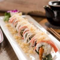 Shaggy Dog · Shrimp tempura, cucumber, cream cheese topped with crab stick, spicy mayo, and eel sauce.