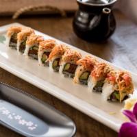 Dakota Roll · Spicy tuna, crunch, avocado topped with spicy crab, spicy mayo, and sweet miso sauce.