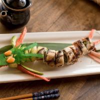 Dragon Roll · Tempura shrimp, asparagus, topped with avocado, unagi, and eel sauce.
