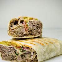 Beef Shawarma Wrap · Premium Layers of top quality tender Beef treated with house-mixed Shawarma spices and marin...