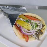 Beef In Pita · Premium Layers of top quality tender Beef treated with house-mixed Shawarma spices and marin...