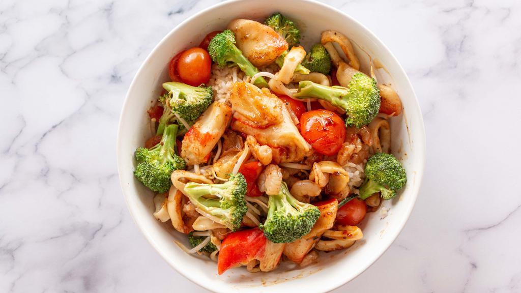 Seafood Delight · Shrimp, crab & calamari stir-fried with water chestnuts, broccoli, tomato, bean sprouts, garlic, salt & lemon pepper, with our sweet Teriyaki sauce, served with your choice of base.