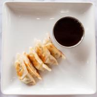 Chicken Potstickers · All white meat chicken, scallions, cabbage and water chestnuts stuffed in a wonton wrapper, ...