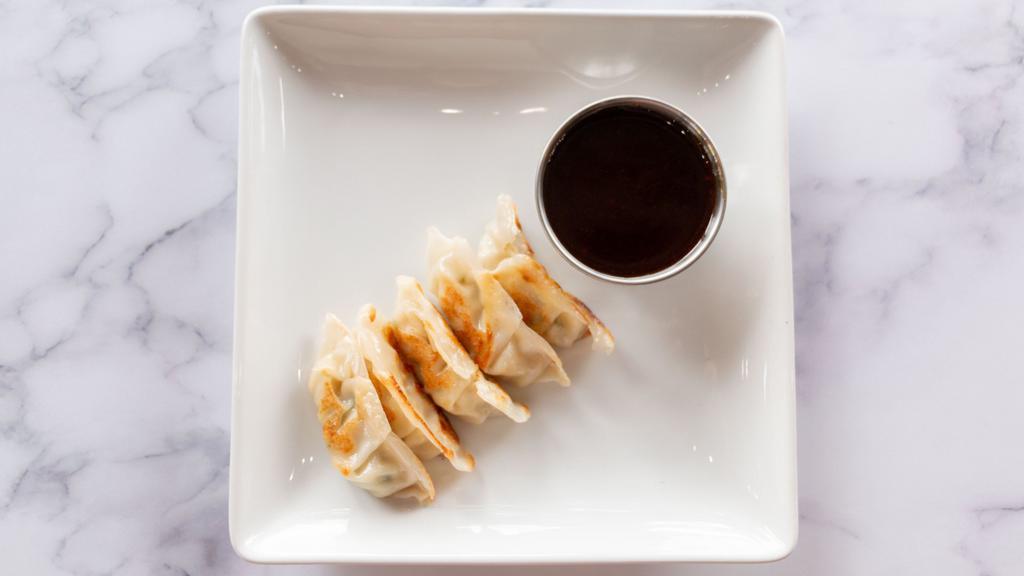 Chicken Potstickers · All white meat chicken, scallions, cabbage and water chestnuts stuffed in a wonton wrapper, then grilled, steamed to perfection, and paired with a killer teriyaki sauce.
