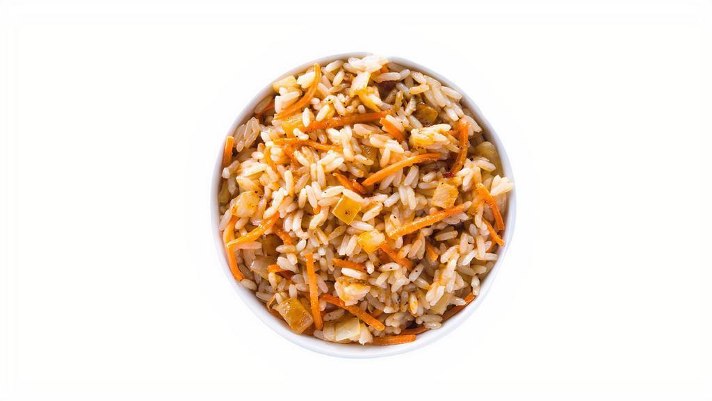 Fried Rice Side · Caramelized onion, carrots, butter, soy sauce, pineapple juice and spices.