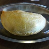 Meat Pie · Seasoned ground beef, potatoes and carrots, wrapped in a savory pie crust.