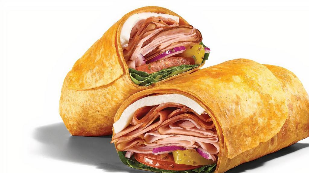 Mozza Meat  · Roll it up and take it down. The Mozza Meat wrap has thin-sliced Black Forest Ham, NEW Italian-style capicola and  Belgioioso® Fresh  Mozzarella rolled in a Tomato Basil wrap with spinach, tomatoes, red onions, and banana peppers and drizzled with our famous MVP Parmesan Vinaigrette™.