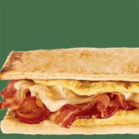 Bacon, Egg & Cheese Footlong With Regular Egg · Start your day in a sizzlin' way with  bacon, egg, and melty cheese on freshly toasted flatb...