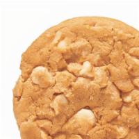 White Chip Macadamia Nut · Chunks of Macadamia nuts and white chips in a ridiculously delicious cookie.