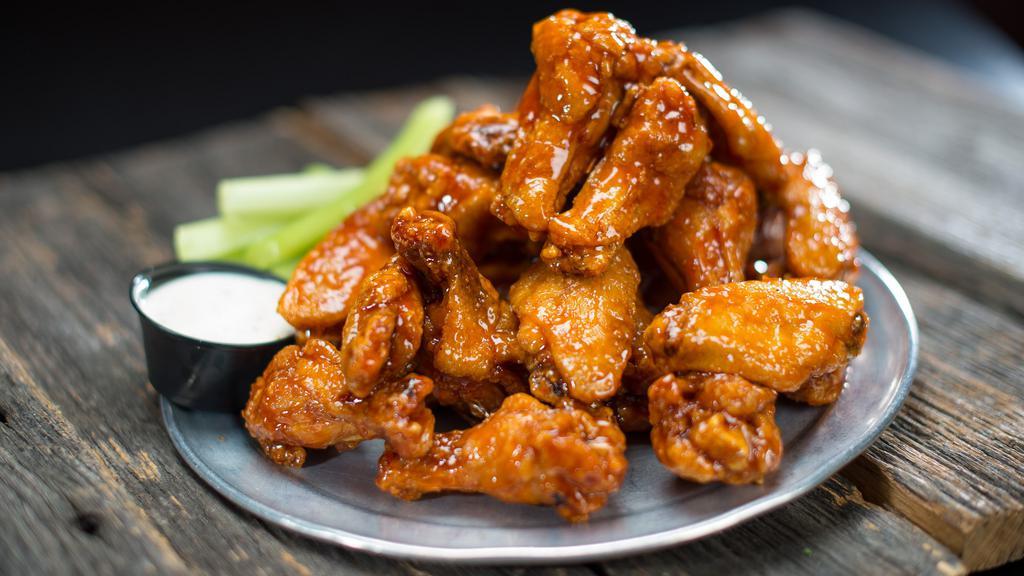 10 Traditional Wings Combo · It's combo time! 10 traditional wings, served with fries