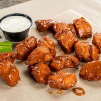 1 Pound Hand-Breaded Boneless Wings · Plump, hand-breaded, boneless chicken wings. Have ‘em tossed in your favorite sauce.