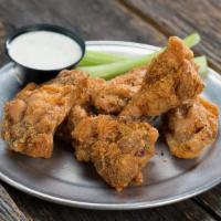 5 Pack Traditional Wings · Our traditional wings are lightly breaded and cooked to perfection then tossed in your favor...