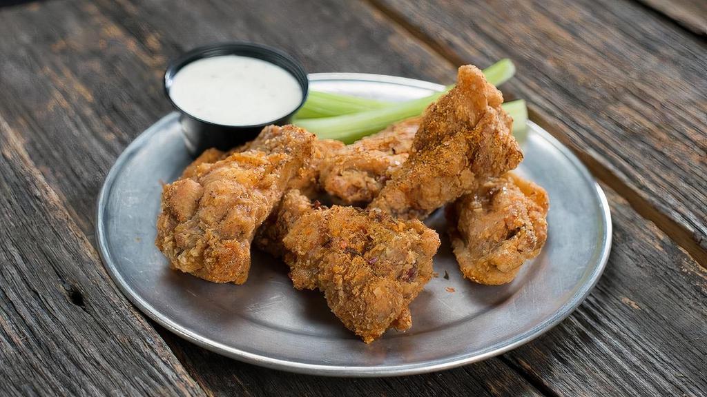 5 Pack Traditional Wings · Our traditional wings are lightly breaded and cooked to perfection then tossed in your favorite sauce or dry rub.