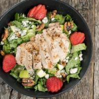 Chicken Apple Walnut Salad · Garden romaine topped with Granny Smith apples, strawberries, candied walnuts, bleu cheese c...