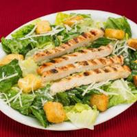Chicken Caesar Salad · Garden fresh romaine topped with grilled chicken breast. Tossed with shredded parmesan, crea...