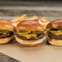 Individual Native Slider* · One ground beef sliders with American cheese and pickle chips served on a warm brioche bun.