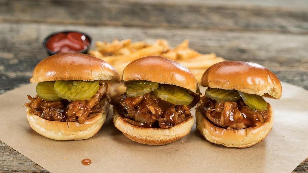 Individual Bbq Pork Slider · One warm shredded pork sliders doused with our Honey BBQ sauce, topped with pickles and nestled between our warm brioche bun.