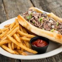 Philly Steak · Thinly sliced rib-eye steak grilled with onions, green bell peppers, and red wine mushrooms....