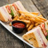 Club Sandwich · A traditional favorite with roasted turkey breast, smoked ham, hardwood smoked bacon, mozzar...