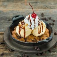 Native Chocolate Chip Cookie Sundae · Served with vanilla ice cream, whipped cream, and chocolate drizzle, and a cherry on top.