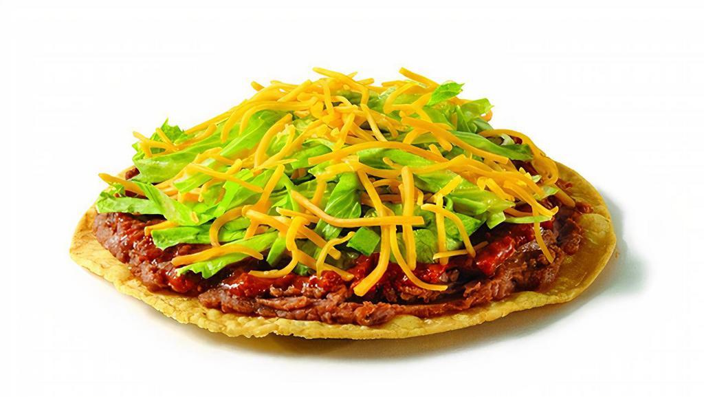 Party Tostada · Fried corn tortilla, beans, chili sauce, lettuce, cheddar.