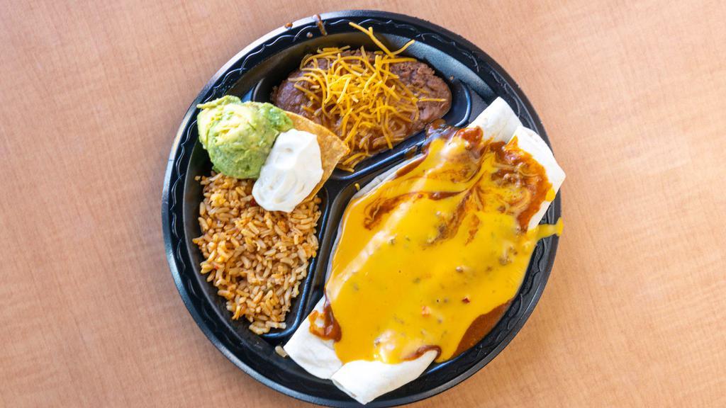 Chicken Chilada/Taco Platter · Chicken Chilada, Chicken Taco (choice of crispy or soft), rice, beans, sour cream, guac, and a small bag of chips