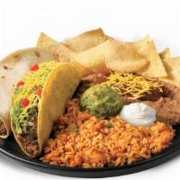 Beef Taco Platter · Two Beef Tacos (choice of crispy or soft), rice, beans, sour cream, guac, and a small bag of...