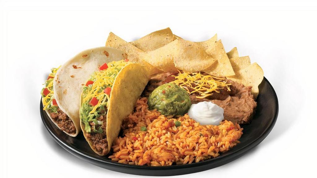 Beef Taco Platter · Two Beef Tacos (choice of crispy or soft), rice, beans, sour cream, guac, and a small bag of chips