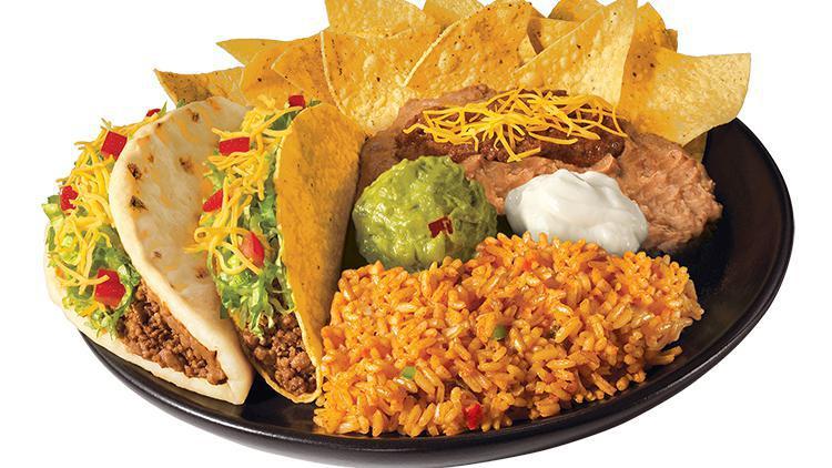 Chicken Muchaco Platter · Chicken Muchaco, Chicken Taco (choice of crispy or soft), rice, beans, sour cream, guac, and a small bag of chips