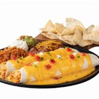 Cheesy Chicken Chilada Platter · Two Cheesy Chicken Chiladas, pico, rice, beans, sour cream, guac, and a small bag of chips