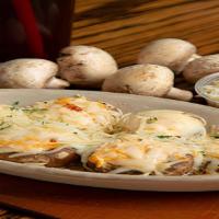 Crm Chz Mush · Fresh mushrooms filled with our spicy cream cheese. Placed in garlic sauce, covered with moz...