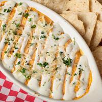 Buffalo Chicken Dip · A blend of cheeses with buffalo chicken baked to a simmering boil. Finished with a drizzle o...