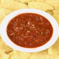 Small Chips And Salsa · A LARGE plate of corn chips served with our signature salsa.