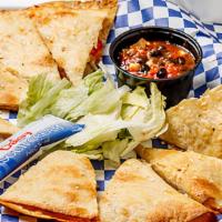 Supreme Quesadilla · Flour tortillas filled with chicken, mozzarella, cheddar, onions and tomatoes. Topped with g...