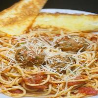 Spaghetti And Meatballs · Spaghetti noodles and meatballs tossed in Al dente sauce and topped with fresh parmesan. Ser...