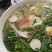Rice Noodle · Seafood Rice Noodle soup served with Sliced Pork, Shrimp, Fish balls and Crab sticks. Lime, ...