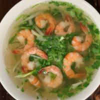 Pho Shrimp · Shrimp in Chicken Pho Broth, Served with cilantro, green onions, and white onions. Bean spro...