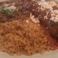 Chile Relleno · Vegetarian. Poblano pepper stuffed with cheese or brisket, battered, fried, and topped with ...